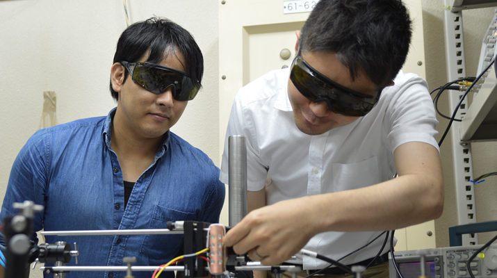 Tomohiro Tojo (left of picture) with his colleagues